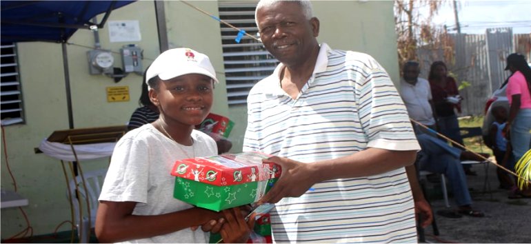 Samaritans Purse Operation Christmas Child shoebox gift distribution at the Mount Zion's Missions Inc Barbados Foursquare Church Impact Community Outreach Children's fun Outreach in Barbados