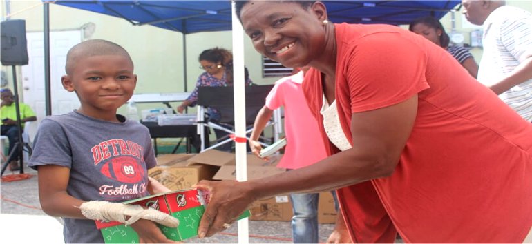 Samaritans Purse Operation Christmas Child shoebox gift distribution at the Mount Zion's Missions Inc Barbados Foursquare Church Impact Community Outreach Children's fun Outreach in Barbados