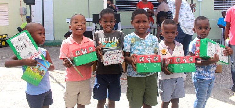 Samaritans Purse Operation Christmas Child shoebox gift distribution at the Mount Zion's Missions Inc Barbados Foursquare Church Impact Community Outreach Children's fun Outreach in Barbados