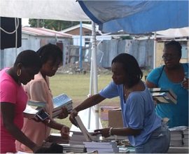 Impacting Our Communities Love Package book distribution