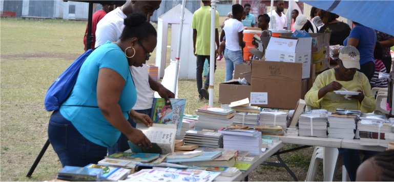 Love Packages book distribution by Mount Zion's Missions Inc Barbados Foursquare Church New Orleans Impact Community Outreach 2019