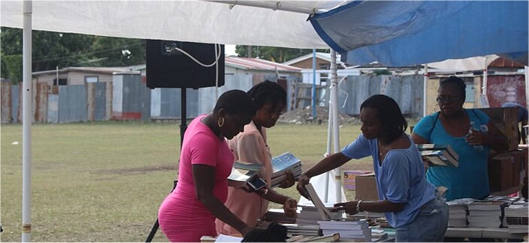 Love Packages book distribution by Mount Zion's Missions Inc Barbados Foursquare Church New Orleans Impact Community Outreach 2019