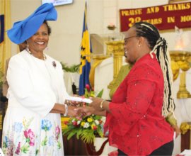 President of Barbados presenting certificates to the new members of the Ruth and Esther Ministry